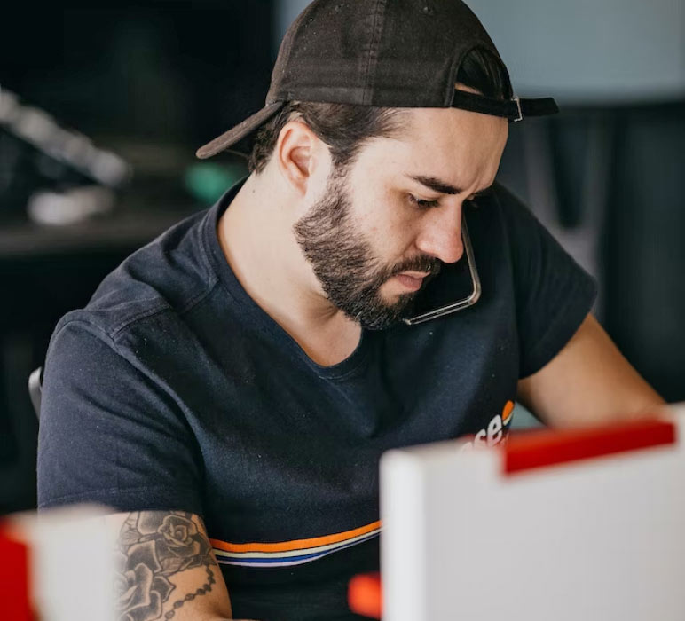 Man with Beard and Tattooed Arm